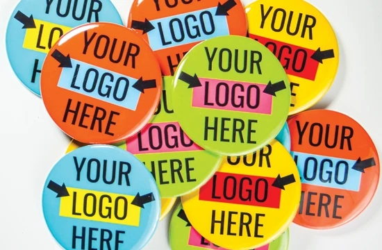 A set of colourful 57mm button badges with your logo here printed on them. Printed by Everybody Loves Badges.